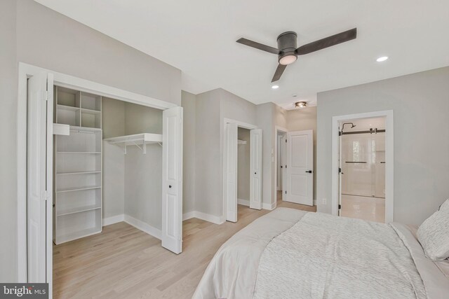 bedroom featuring a ceiling fan, wood finished floors, baseboards, connected bathroom, and recessed lighting