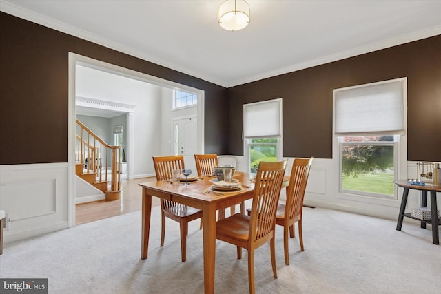 1 Arbor Lea Cir, Doylestown, PA 18901 - dining room with light carpet, stairs, ornamental molding, and a wainscoted wall