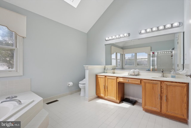 1 Arbor Lea Cir, Doylestown, PA 18901 - bathroom with a garden tub, double vanity, a skylight, a shower stall, and toilet