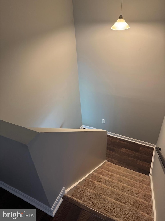 661 Hartman Ave, Hanover, PA 17331 - stairway featuring baseboards and wood finished floors
