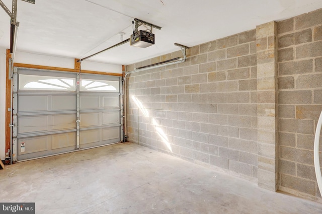 661 Hartman Ave, Hanover, PA 17331 - garage featuring concrete block wall and a garage door opener
