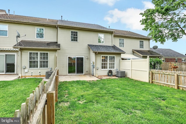 661 Hartman Ave, Hanover, PA 17331 - rear view of house featuring central AC unit, a yard, a patio, and fence