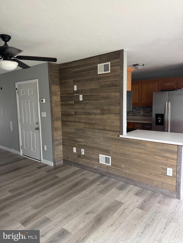 661 Hartman Ave, Hanover, PA 17331 - unfurnished living room with light wood-style floors, a ceiling fan, and visible vents