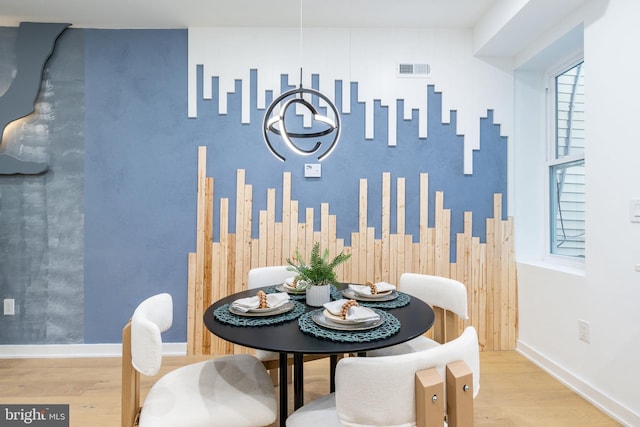 2074 E Birch St, Philadelphia, PA 19134 - dining room featuring baseboards and wood finished floors
