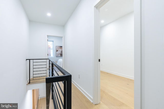 2074 E Birch St, Philadelphia, PA 19134 - hall with recessed lighting, baseboards, an upstairs landing, and light wood-style floors