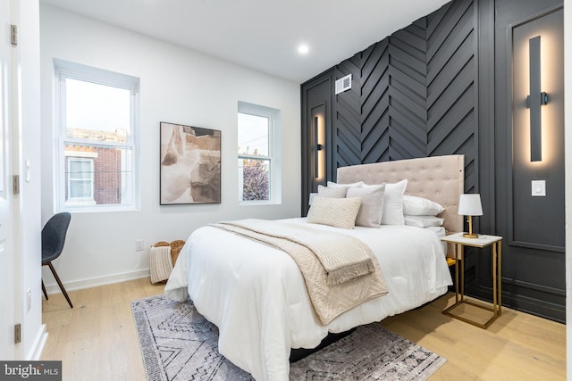 2074 E Birch St, Philadelphia, PA 19134 - bedroom featuring light wood-style floors, baseboards, multiple windows, and visible vents