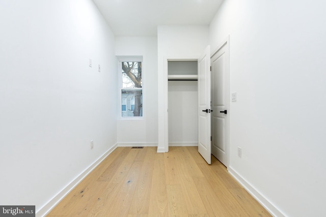 2074 E Birch St, Philadelphia, PA 19134 - unfurnished bedroom featuring baseboards, visible vents, and light wood-style floors