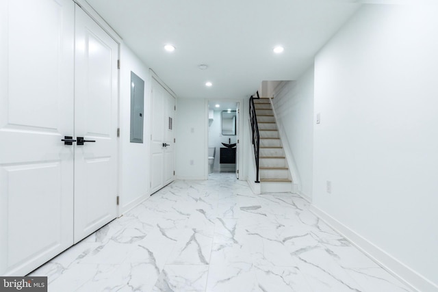 2074 E Birch St, Philadelphia, PA 19134 - corridor featuring recessed lighting, marble finish floor, baseboards, and stairway