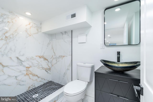 2074 E Birch St, Philadelphia, PA 19134 - full bathroom with visible vents, vanity, toilet, a marble finish shower, and recessed lighting