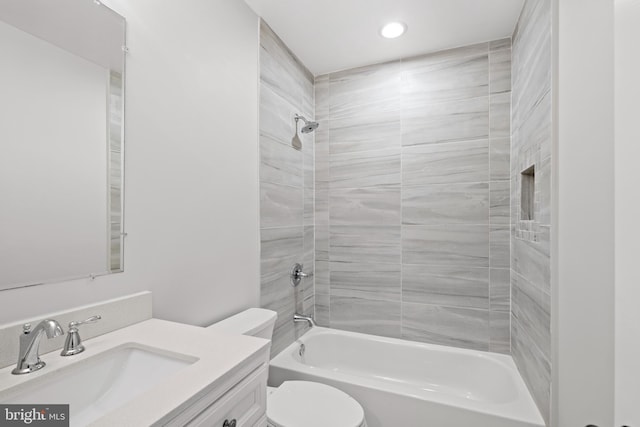 full bath featuring vanity, recessed lighting, tub / shower combination, and toilet