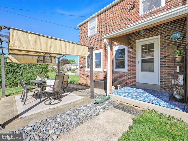 view of patio featuring outdoor dining space