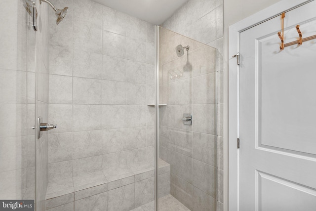 full bathroom featuring a stall shower
