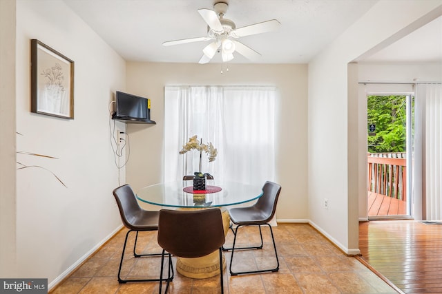 3203 Forest Run Dr, District Heights, MD 20747 - dining area with baseboards and ceiling fan
