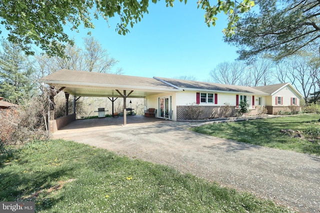 2042 Baltimore Pike, East Berlin, PA 17316 - ranch-style house featuring a carport, driveway, and a front yard