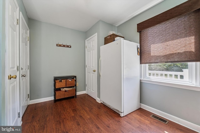 380 Bishop Hollow Rd, Newtown Square, PA 19073 - kitchen featuring freestanding refrigerator, dark wood-style floors, and baseboards