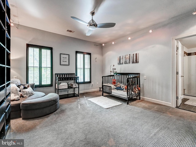 carpeted bedroom with baseboards