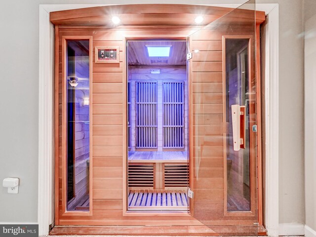 sauna / steam room with baseboards