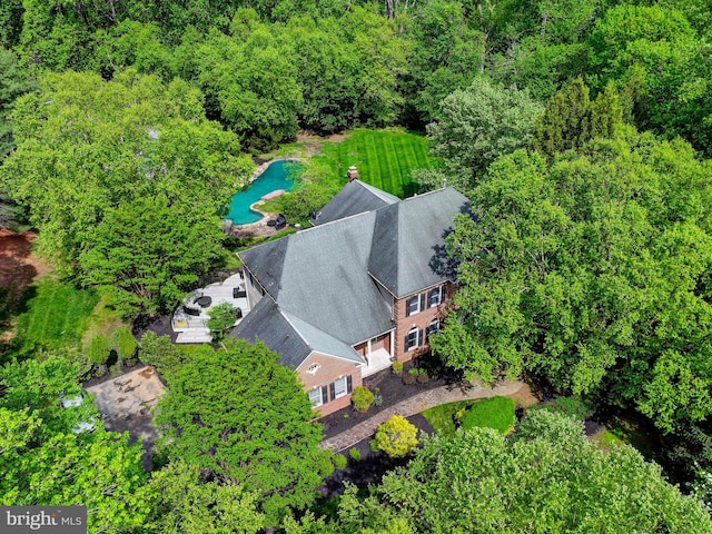 view of subject property featuring a pool