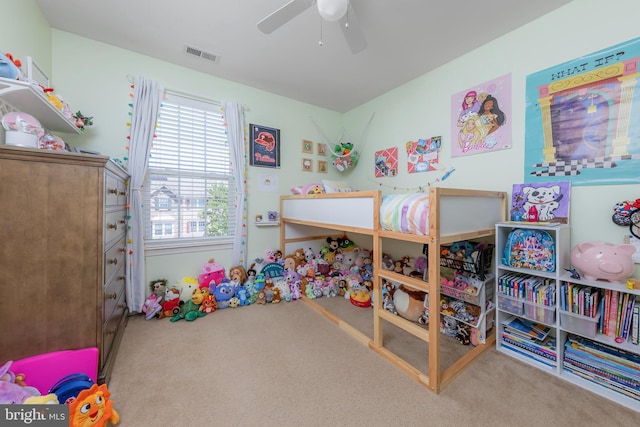 bedroom featuring carpet floors, ceiling fan, and visible vents
