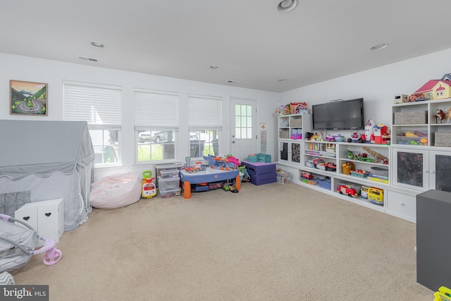 game room with recessed lighting, visible vents, and carpet