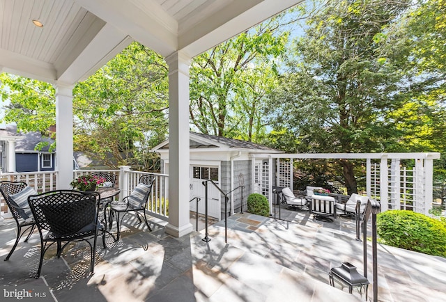 4416 Stanford St, Chevy Chase, MD 20815 - view of patio featuring an outdoor living space, an outbuilding, and outdoor dining area
