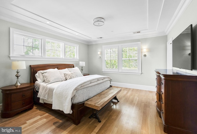 4416 Stanford St, Chevy Chase, MD 20815 - bedroom featuring ornamental molding, light wood-style flooring, and multiple windows