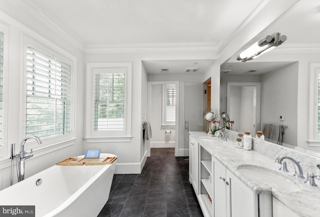 4416 Stanford St, Chevy Chase, MD 20815 - bathroom with double vanity, a freestanding bath, a sink, and visible vents