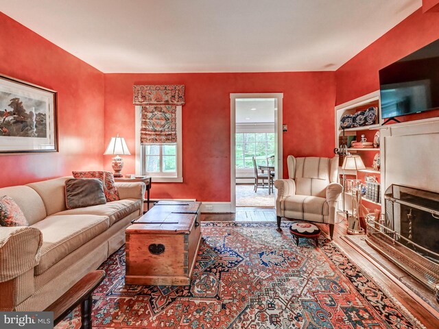 living room with wood finished floors