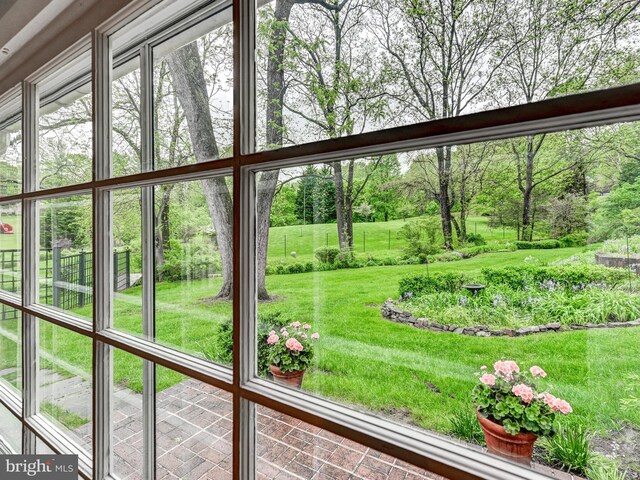 doorway to outside with view of scattered trees