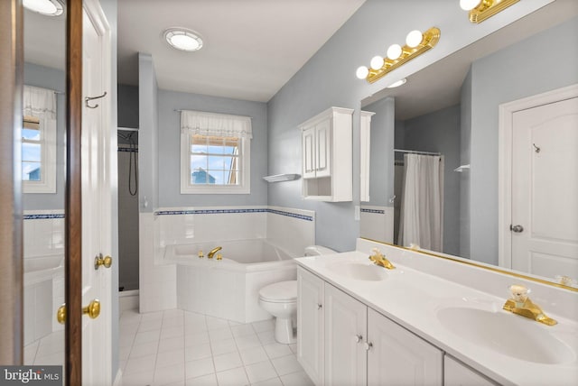 full bath with a sink, a bath, tile patterned floors, and a shower with shower curtain