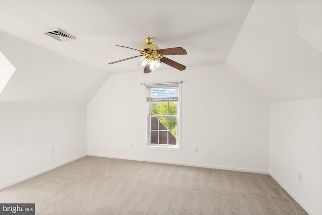 bonus room featuring visible vents, carpet flooring, ceiling fan, and lofted ceiling