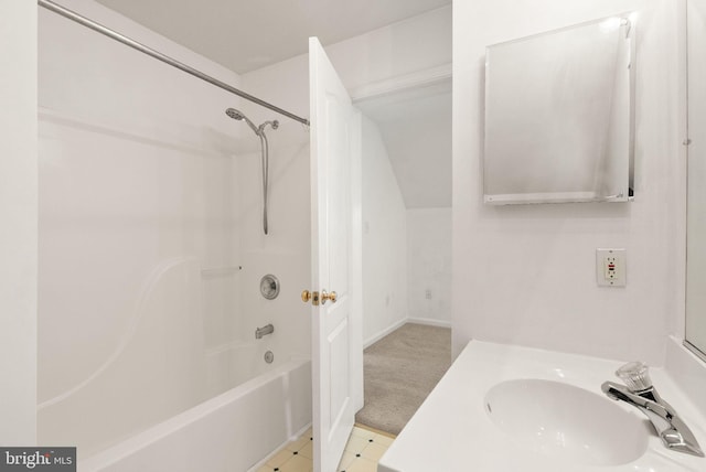 bathroom featuring a sink and bathtub / shower combination