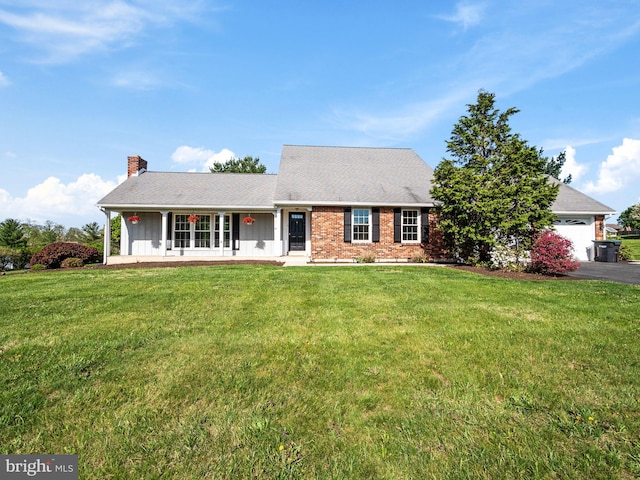 single story home with a front lawn, covered porch, and a chimney
