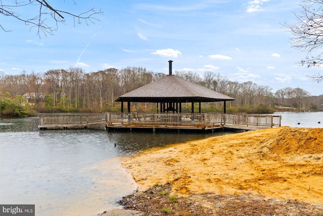dock area featuring a gazebo and a water view