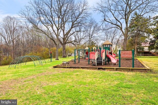 community play area with a lawn