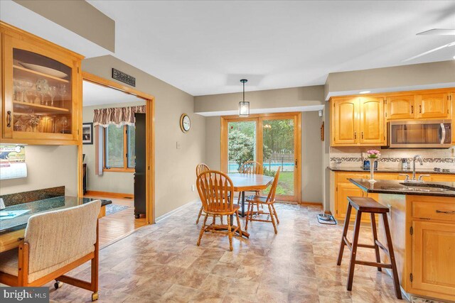 8 Winchester Ct, Tabernacle, NJ 08088 - dining area featuring baseboards and stone finish floors