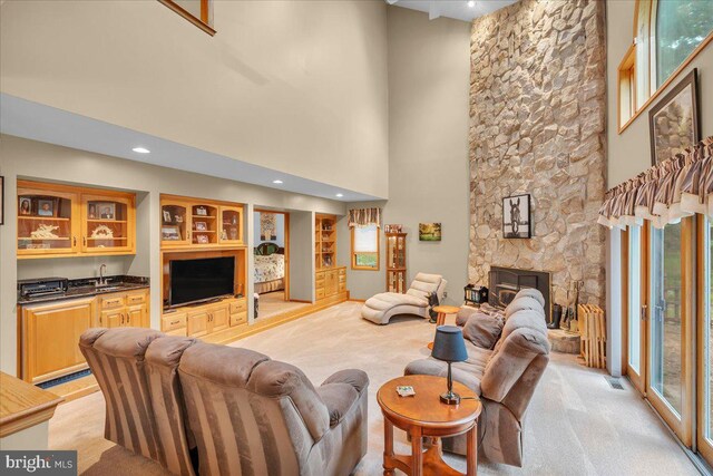 8 Winchester Ct, Tabernacle, NJ 08088 - living area with light carpet, a fireplace, a high ceiling, and recessed lighting