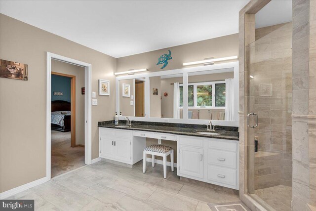 8 Winchester Ct, Tabernacle, NJ 08088 - ensuite bathroom featuring double vanity, a shower stall, and baseboards