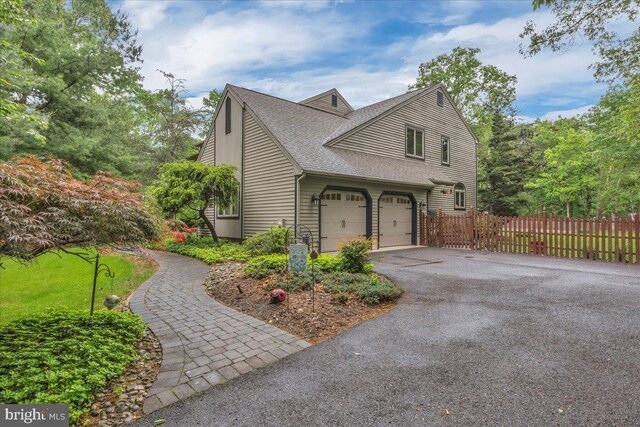8 Winchester Ct, Tabernacle, NJ 08088 - view of side of home featuring a shingled roof and driveway