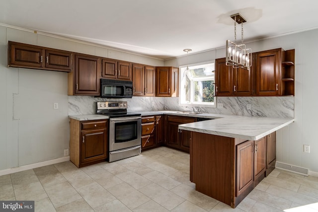 1114 Colonial Rd, Lancaster, PA 17603 - kitchen with backsplash, stainless steel range with electric cooktop, black microwave, and a peninsula