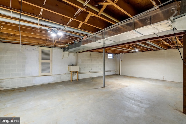1114 Colonial Rd, Lancaster, PA 17603 - unfinished below grade area featuring concrete block wall and a sink
