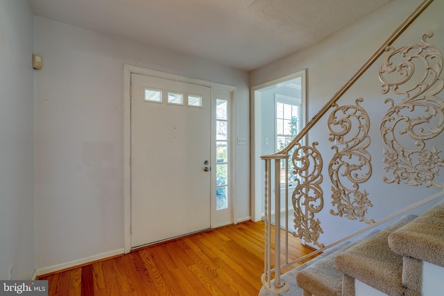 1114 Colonial Rd, Lancaster, PA 17603 - entryway featuring plenty of natural light, light wood-style flooring, and stairs