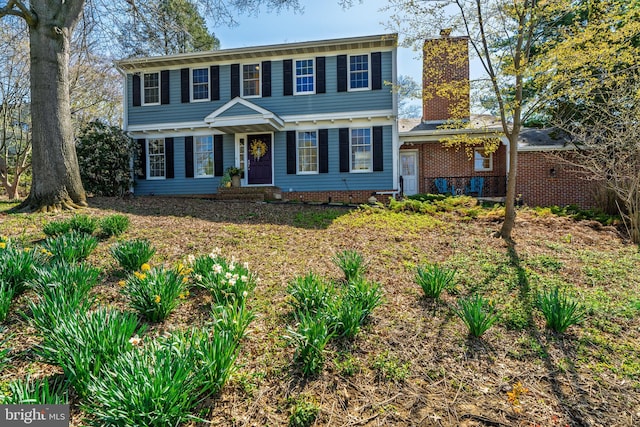 1114 Colonial Rd, Lancaster, PA 17603 - view of front facade with a chimney