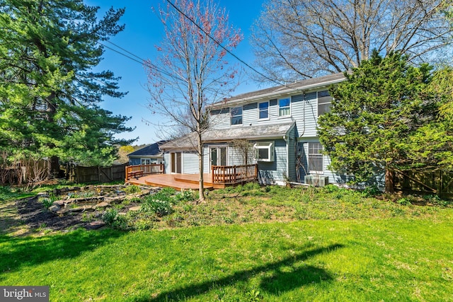 1114 Colonial Rd, Lancaster, PA 17603 - rear view of house with fence, central air condition unit, a yard, and a deck