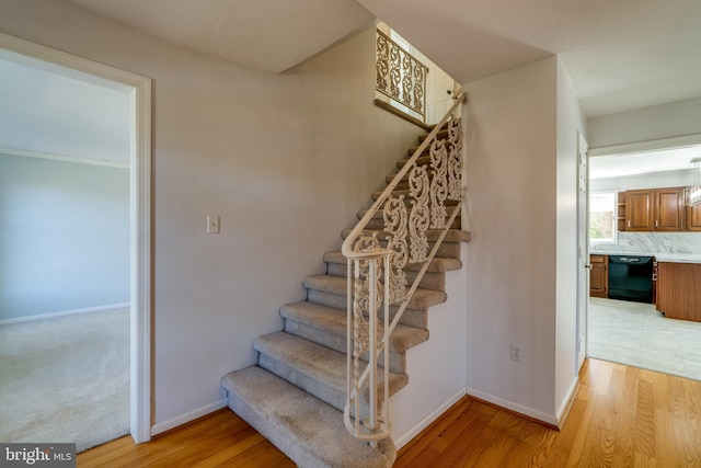 1114 Colonial Rd, Lancaster, PA 17603 - stairway with baseboards and wood finished floors