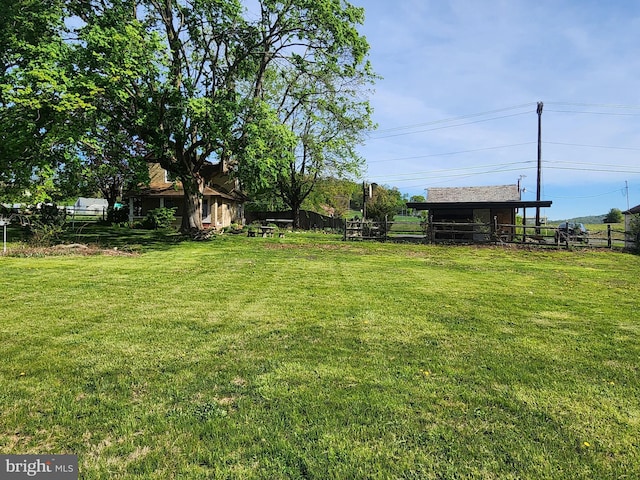 view of yard featuring fence