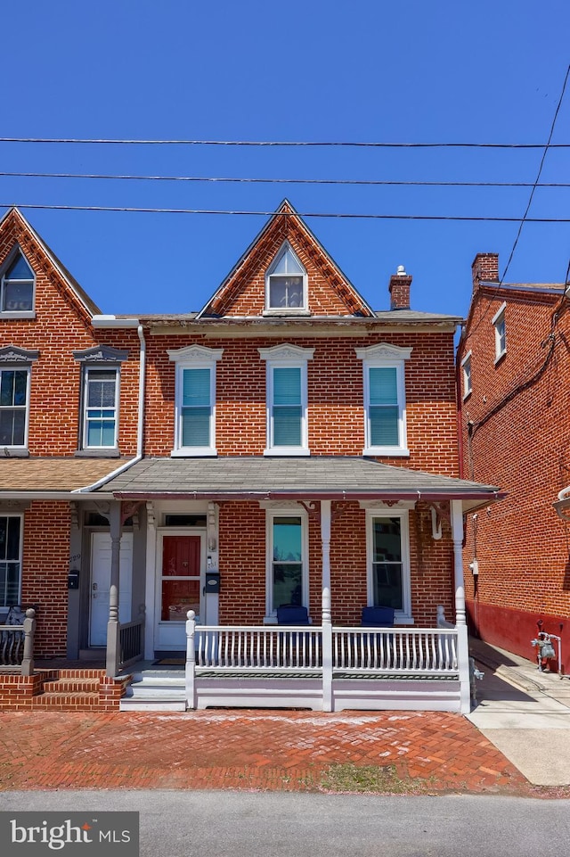 731 Locust St, Columbia, PA 17512 - view of front of home with covered porch and brick siding