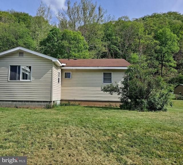 exterior space with a lawn