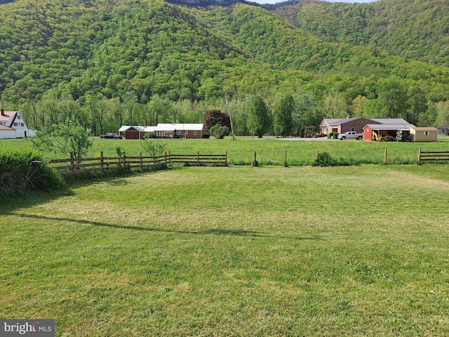 mountain view with a forest view and a rural view