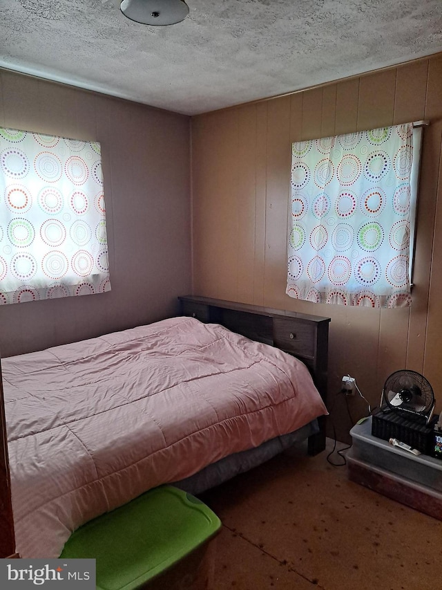 bedroom with a textured ceiling